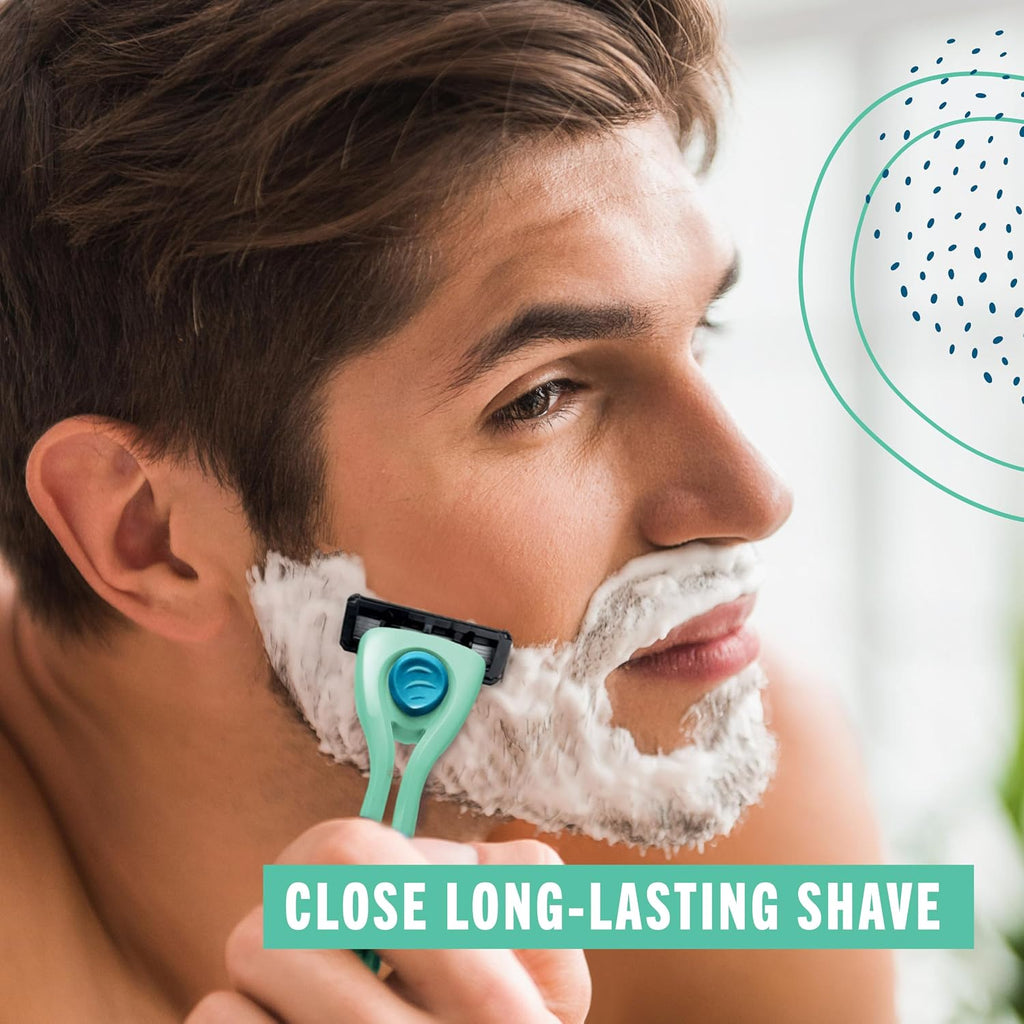 A man shaving with a green Preserve Shave 5 razor, covered with white shaving foam, with the text 'CLOSE LONG-LASTING SHAVE' at the bottom.