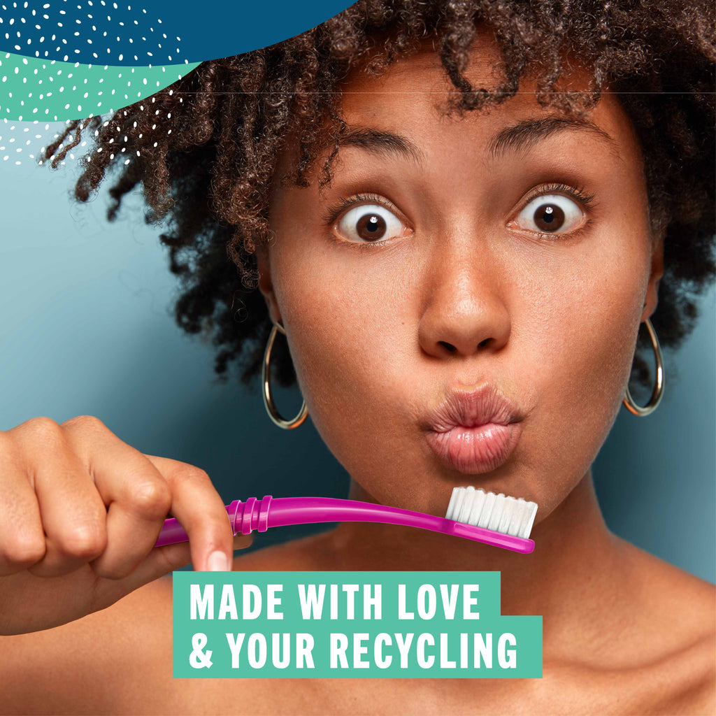 Woman holding a pink toothbrush with text 'Made with love & your recycling' on a blue background