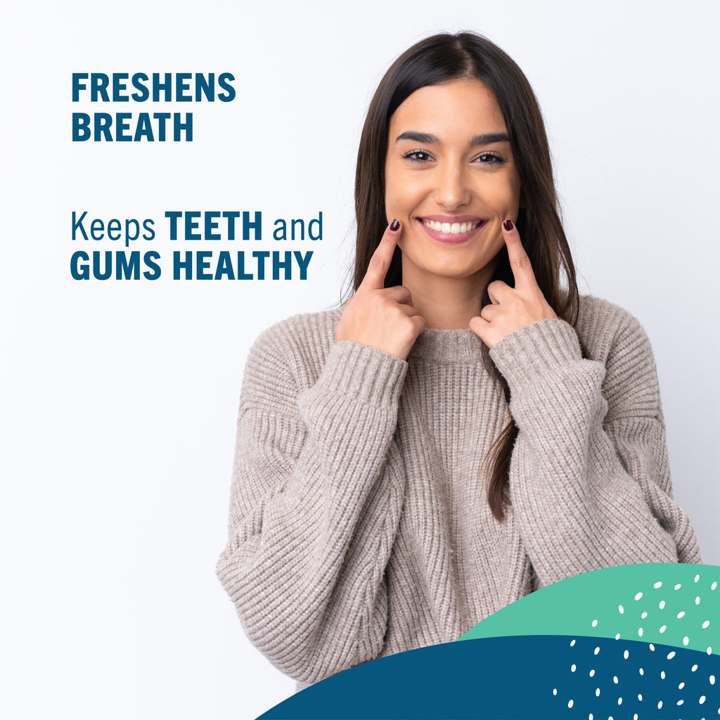 Woman pointing to her smile with text stating "freshens breath" and "keeps teeth and gums healthy".