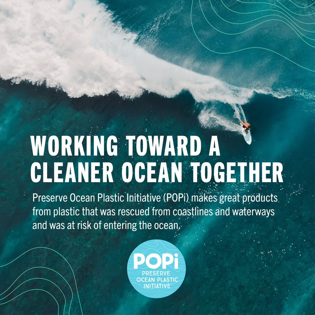 A square promotional graphic with a large ocean wave and a small surfer in teal water. White text reads 'WORKING TOWARD A CLEANER OCEAN TOGETHER,' with smaller text below about the Preserve Ocean Plastic Initiative (POPi) and a circular POPi logo at the bottom.